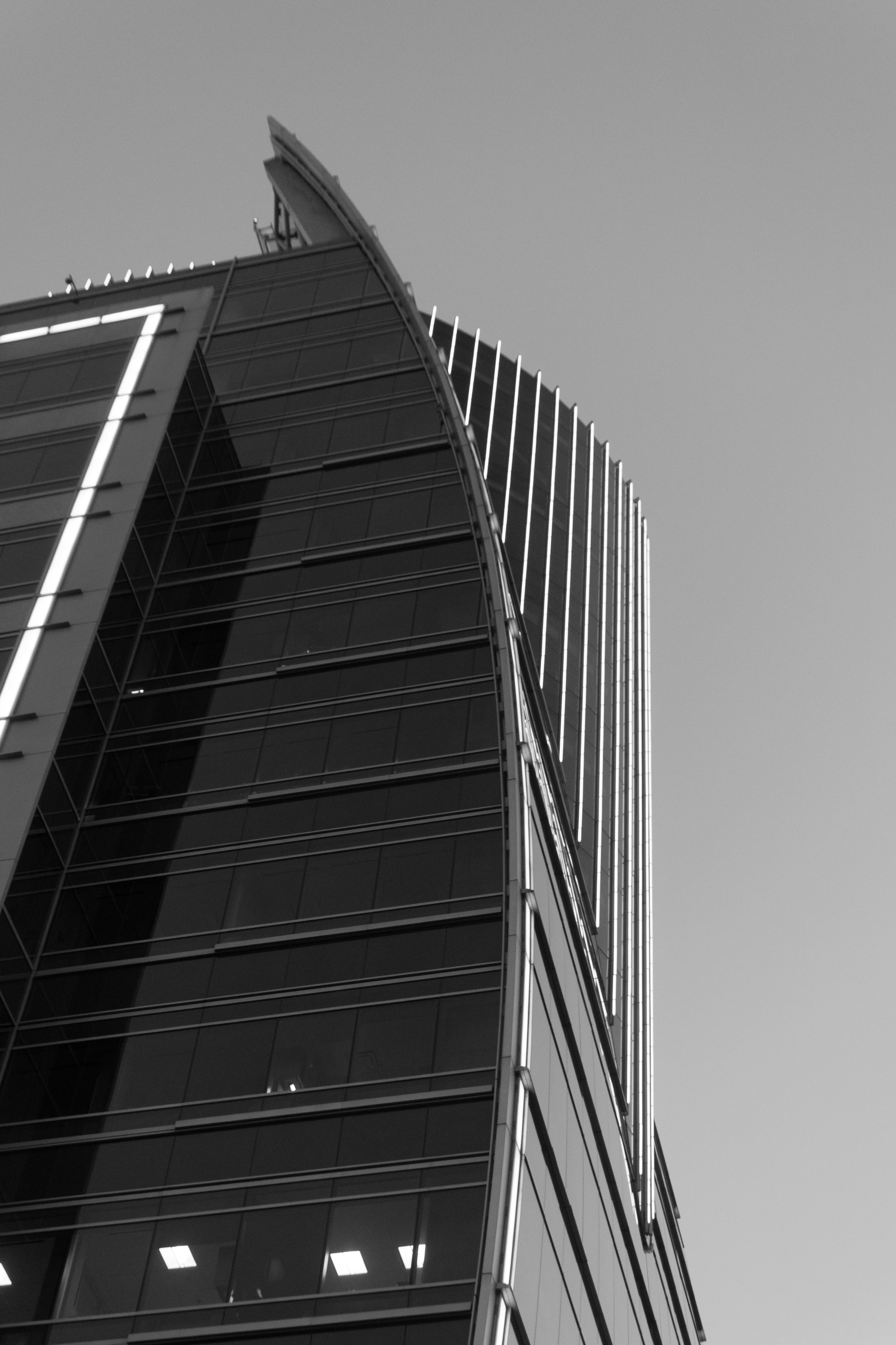Black and white building exterior representing legal and compliance authority